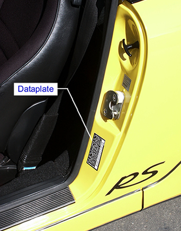 Look at the drivers door jamb - below the latch.