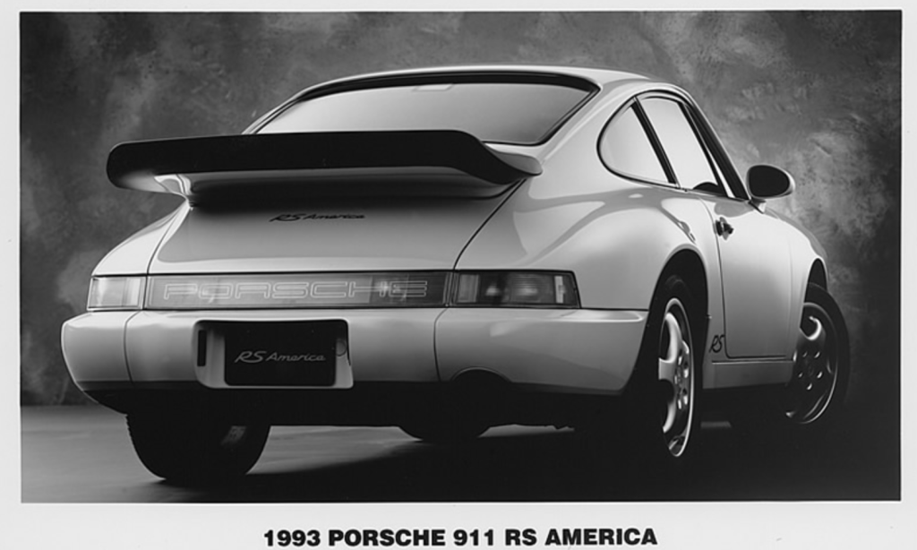 this image is of a Guards Red car and appears in full color
on the inside of the factory sales brochure.